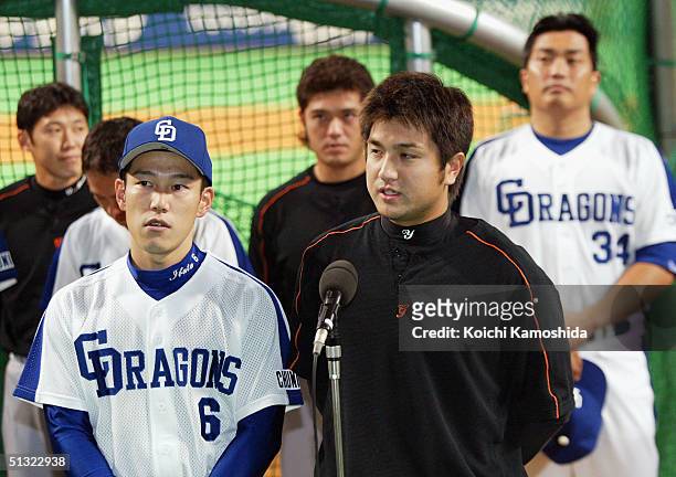 The Chunichi Dragons team captain Hirokazu Ibata and Yomiuri Giants team captain Yoshinobu Takahashi speak to fans at Nagoya Dome, on September 19,...
