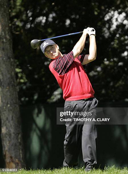 Ryder Cup golfer David Toms watches his tee shot on the second hole during his singles match against Colin Montgomerie 19 September, 2004 at Oakland...