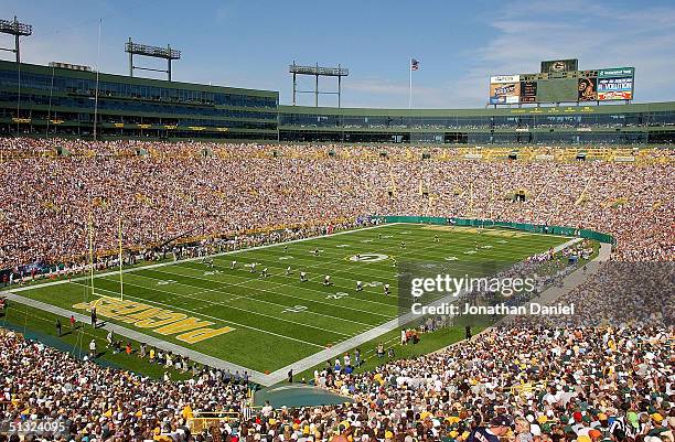 General view of the opening kick-off during a game between the Green Bay Packers and the Chicago Bears at Lambeau Field on September 19, 2004 in...