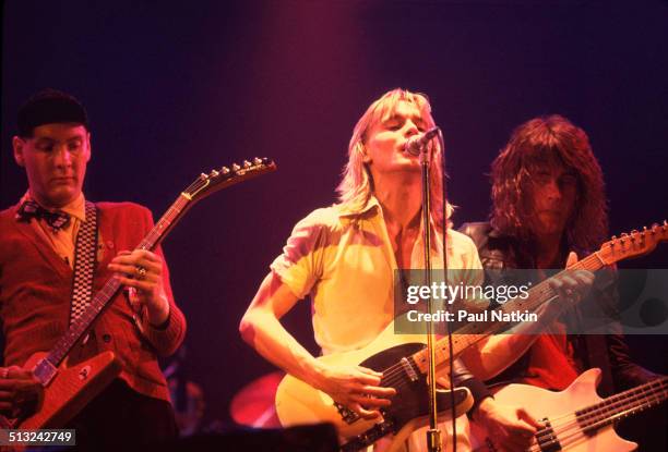 From left, American musicians Rick Nielsen, Robin Zander, and Tom Petersson, of the band Cheap Trick, perform at the Riviera Theater, Chicago,...