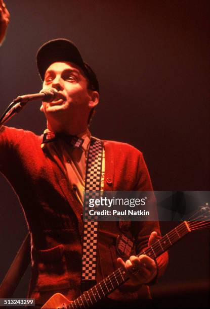 American musician Rick Nielsen sings and plays guitar as he performs with Cheap Trick at the Riviera Theater, Chicago, Illinois, October 29, 1977.