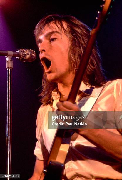 American musician Robin Zander sings and plays guitar as he performs with Cheap Trick at the Riviera Theater, Chicago, Illinois, October 29, 1977.