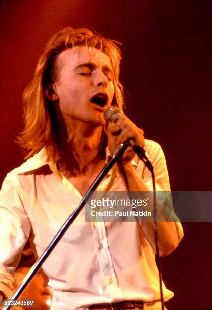 American musician Robin Zander sings and sings as he performs with Cheap Trick at the Riviera Theater, Chicago, Illinois, October 29, 1977.