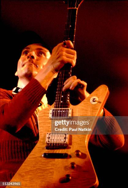 American musician Rick Nielsen plays guitar as he performs with Cheap Trick at the Riviera Theater, Chicago, Illinois, October 29, 1977.