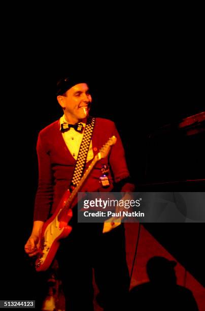 American musician Rick Nielsen plays guitar as he performs with Cheap Trick at the Riviera Theater, Chicago, Illinois, October 29, 1977.