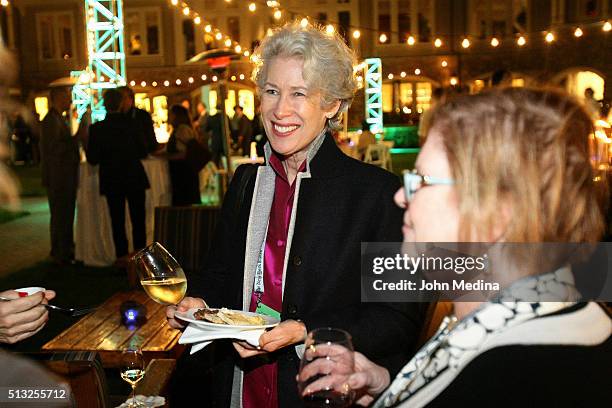 Guests attend the closing cocktail reception at The New York Times New Work Summit on March 1, 2016 in Half Moon Bay, California.