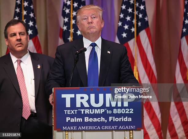 Republican Presidential frontrunner Donald Trump listens to a reporter's question at his Mar-A-Lago Club on Super Tuesday, March 1, 2016 in Palm...