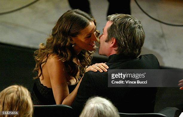 Actress Sarah Jessica Parker kisses her husband, actor Matthew Broderick, during the 56th Annual Primetime Emmy Awards at the Shrine Auditorium...