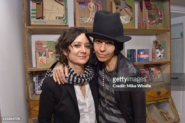 Actress Sara Gilbert and singer Linda Perry attend the Grand Opening Of Au Fudge, Presented By Amazon Family on March 1, 2016 in West Hollywood,...