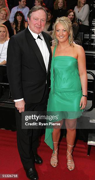 Kevin Sheedy, coach of Essendon and his daughter Jessica arrive for the Brownlow Medal Dinner at the Crown Casino, on September 20, 2004 in...