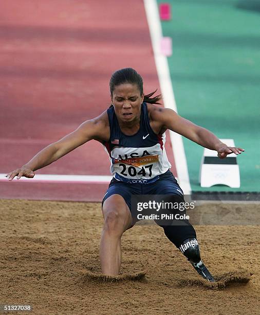 April Holmes of the United States of America in action during the Long Jump F44/46 Final at the Athens 2004 Paralympic Games at the Olympic Stadium...