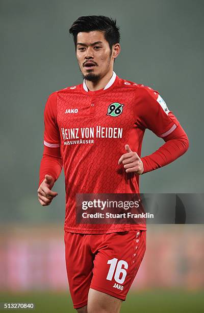 Hotaru Yamaguchi of Hannover looks on during the Bundesliga match between Hannover 96 and VfL Wolfsburg at HDI-Arena on March 1, 2016 in Hanover,...