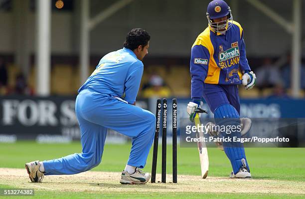 Russel Arnold of Sri Lanka is run out as Anil Kumble removes the bails during the NatWest Series One Day International between India and Sri Lanka at...