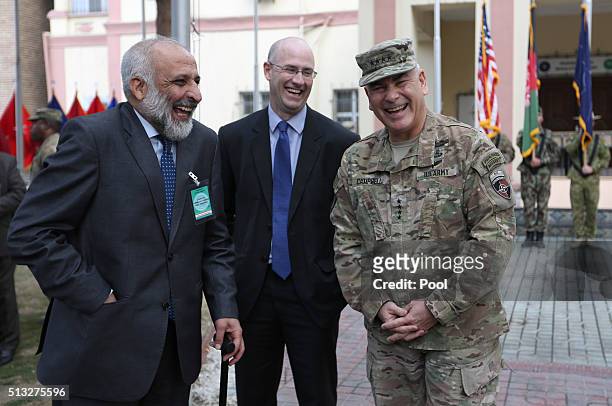 Army General John Campbell , the outgoing commander of Resolute Support forces and United States forces in Afghanistan, and Afghan acting Defence...
