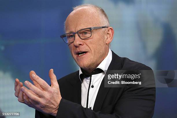 John Caudwell, billionaire and founder of Phones4U Ltd., gestures as he speaks during a Bloomberg Television interview in London, U.K., on Wednesday,...