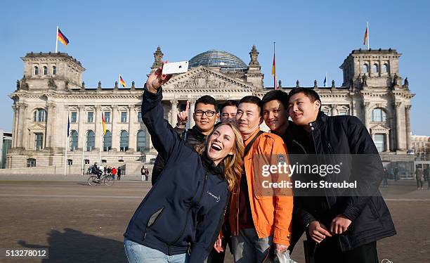 Laureus ambassador Kathi Woerndl interacts with tourists at Reichstag during the Berlin Nominations for the Laureus World Sports Awards 2016 on March...
