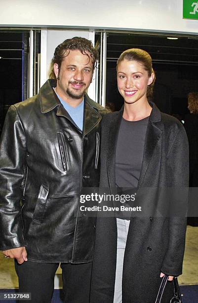 Shannon Elizabeth and her boyfriend attend the UK Premiere of "American Pie 2" at The Odeon Cinema followed by the party at Titanic Restaurant on...