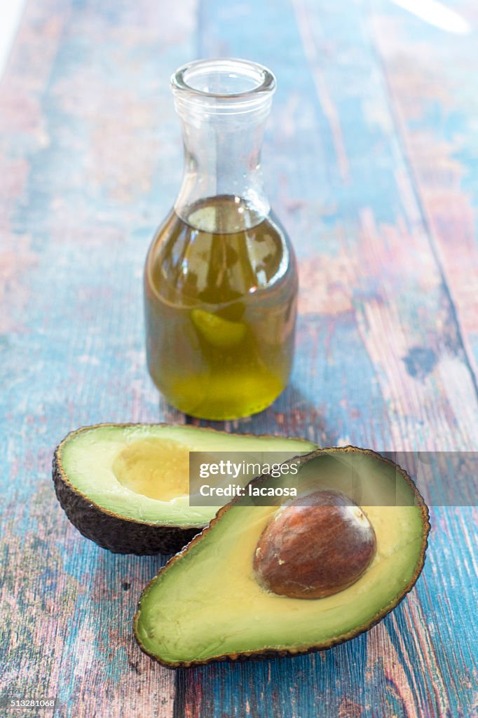 Avocado oil and fresh sliced Avocado