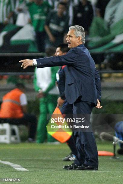 Reinaldo Rueda head coach of Atletico Nacional gives instructions to his players during a group stage match between Atletico Nacional and Sporting...