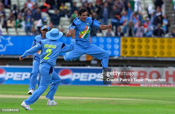 Irfan Pathan of India celebrates the wicket of Imran Farhat of Pakistan during the ICC Champions Trophy match between India and Pakistan, Edgbaston,...