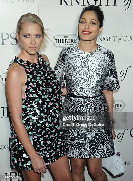 Actors Teresa Palmer and Freida Pinto arrive at the premiere of Broad Green Pictures' "Knight Of Cups" on March 1, 2016 in Los Angeles, California.
