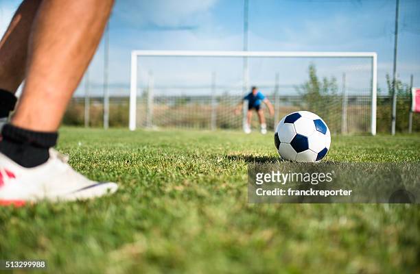soccer player at the penalty - shootout stock pictures, royalty-free photos & images