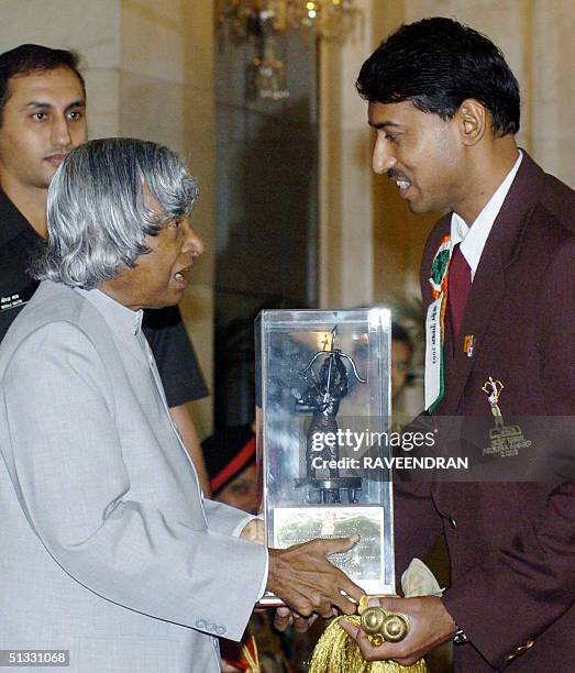 Indian Olympic 2004 silver medalist Rajyavardhan Singh Rathore , receives the prestigious Arjuna Award, from Indian President A.P.J. Abdul Kalam at...