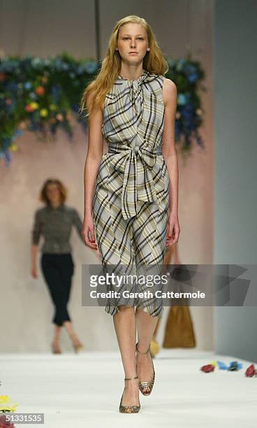 Models walk down the runway at the Betty Jackson fashion show as part of London Fashion Week Spring/Summer 2005 at the BFC Tent, Duke of York's HQ,...