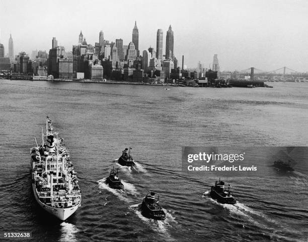 View of the New York City skyline as seen from the Hudson River, New York, New York, circa 1940s.