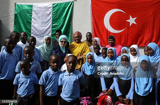 Turkish President Recep Tayyip Erdogan's wife Emine Erdogan and Nigerian President Muhammadu Buhari's wife Aisha Buhari take cares with orphan...