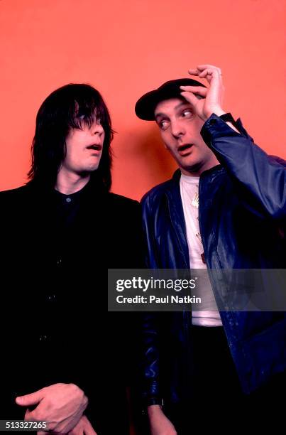 Portrait of American musicians Todd Rundgren and Rick Nielsen, guitarist for Cheap Trick, as they pose backstage at Park West, Chicago, Illinois,...