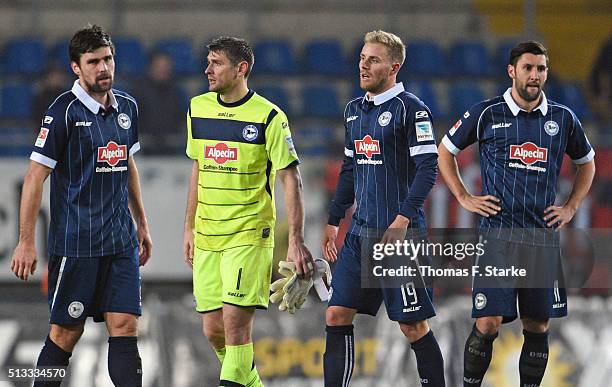 Florian Dick, Wolfgang Hesl, Felix Burmeister and Stephan Salger look dejected after losing the Second Bundesliga match between Arminia Bielefeld and...
