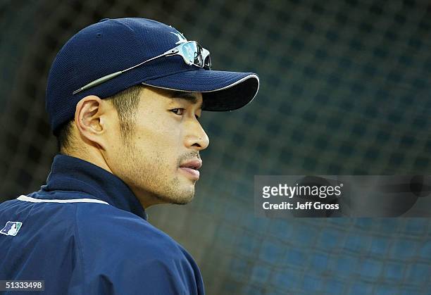 Ichiro Suzuki of the Seattle Mariners watches batting practice prior to the start of a game against the Anaheim Angels on September 21, 2004 at Angel...
