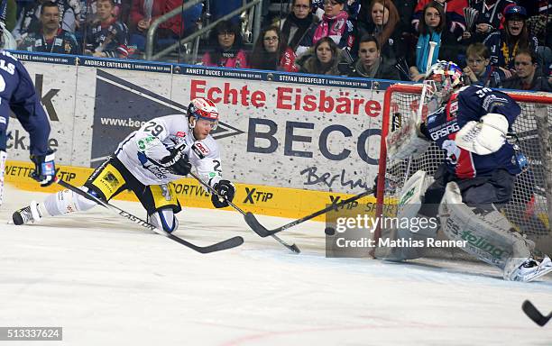 Yan Stastny of the Schwenninger Wild Wings and Kevin Nastiuk of the Eisbaeren Berlin during the game between the Eisbaeren Berlin and the...