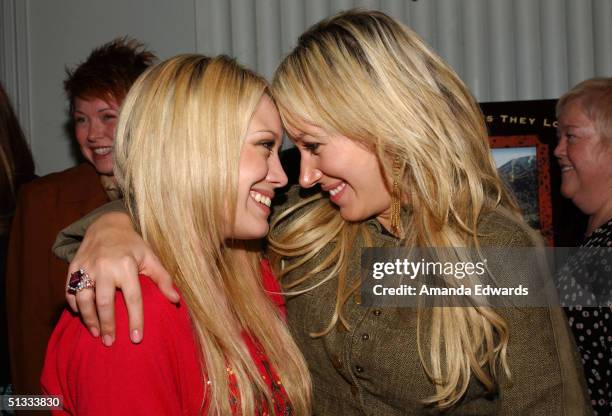 Actresses Hilary and Haylie Duff attend the "People We Know, Horses They Love" book launch party on September 21, 2004 at Hotel Casa Del Mar, in...