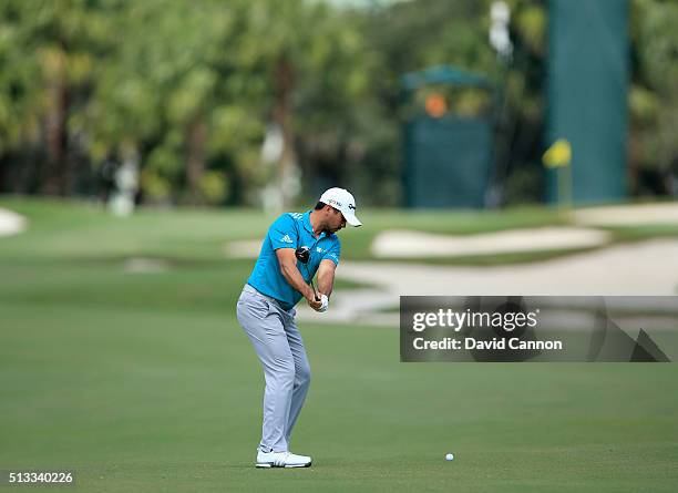 Jason Day of Australia plays a 3 wood on the Blue Monster Course at the Trump National Resort on March 1, 2016 in Doral, Florida.