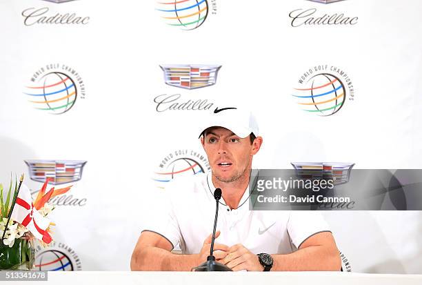Rory McIlroy of Northern Ireland speaks to the meidia during the final day of practice on the Blue Monster Course at the Trump National Resort on...