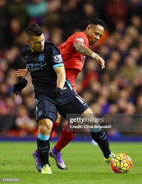 Sergio Aguero of Manchester City challenges Nathaniel Clyne of Liverpool for the ball during the Barclays Premier League match between Liverpool and...
