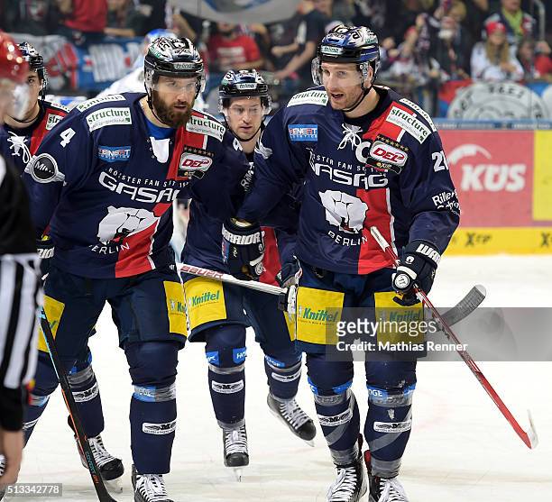 Henry Haase and Andre Rankel of the Eisbaeren Berlin celebrate after scoring the 2:0 during the game between the Eisbaeren Berlin and the...