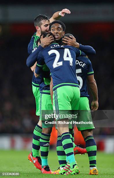 Wayne Routledge of Swansea City is congratulated by teammates after scoring the equalising goal during the Barclays Premier League match between...