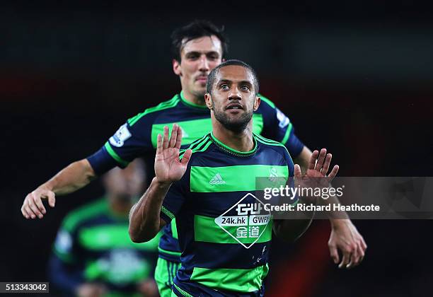 Wayne Routledge of Swansea City celebrates scoring the equalising goal during the Barclays Premier League match between Arsenal and Swansea City at...