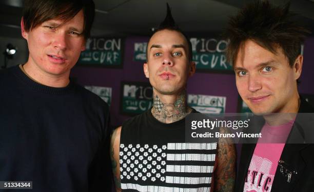 Blink 182 pose for photographs before "MTV Icon 2004 - The Cure" at Old Billingsgate Market on September 17, 2004 in London. The annual live tribute...