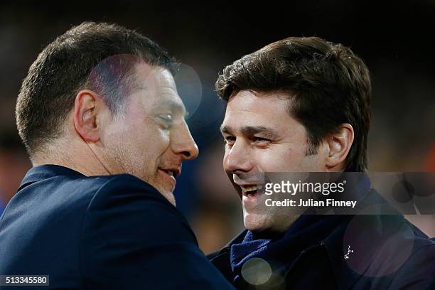 Slaven Bilic manager of West Ham United and Mauricio Pochettino Manager of Tottenham Hotspur prior to the Barclays Premier League match between West...