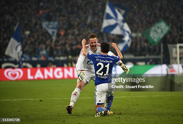 Alessandro Schöpf of Schalke celebrates scoring his goal with Ralf Fährmann during the Bundesliga match between FC Schalke 04 and Hamburger SV at...