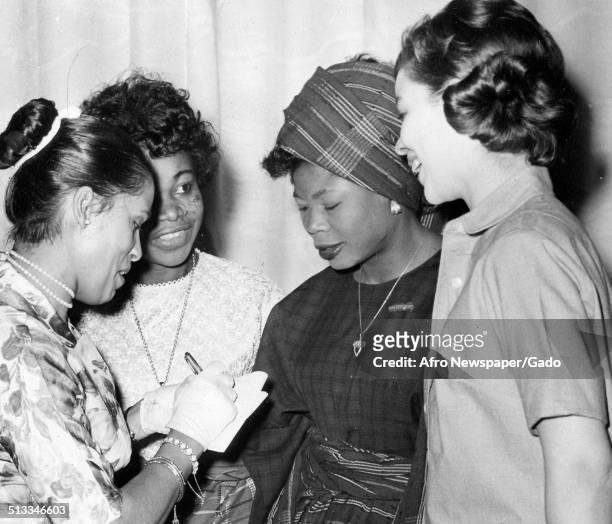 Marguerite Belafonte and Nigerian models, February 29, 1964.