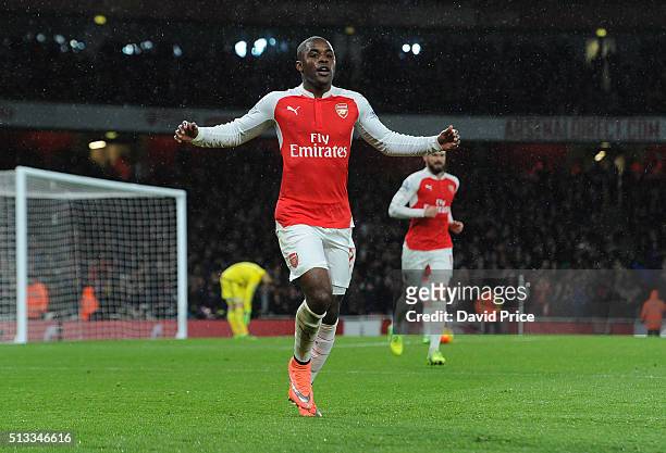 Joel Campbell celebrates scoring a goal for Arsenal during the Barclays Premier League match between Arsenal and Swansea City at Emirates Stadium on...