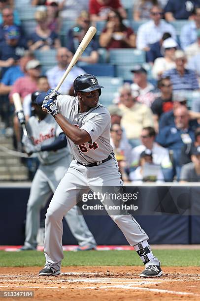 Detroit Tigers outfielder John Mayberry Jr. #64 bats during the first inning of the Spring Training Game against the New York Yankees at George...