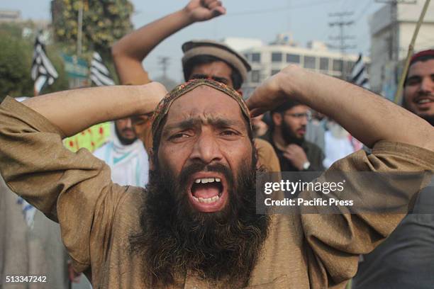 Member of Pakistani Islamists shouts slogans during a protest in Lahore against the execution of convicted murderer Mumtaz Qadri. Adyala Jail hanged...