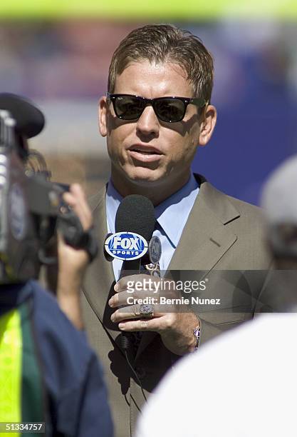 Quarterback Troy Aikman who played for the Dallas Cowboys announcing for Fox Sports from the sidelines prior to the game between the New York Giants...