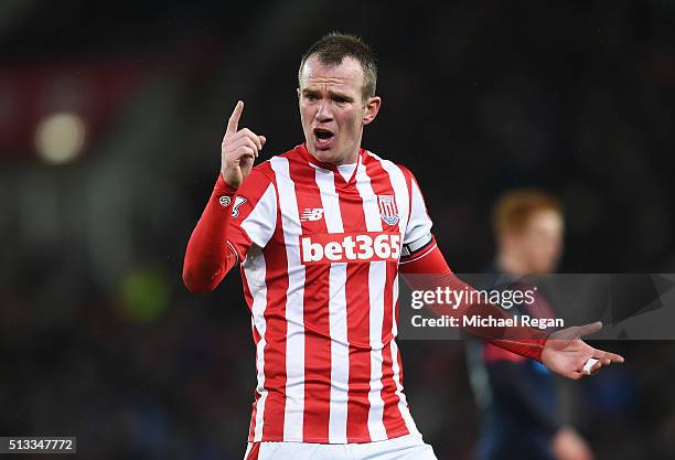 Glenn Whelan of Stoke City gestures during the Barclays Premier League match between Stoke City and Newcastle United at the Britannia Stadium on...